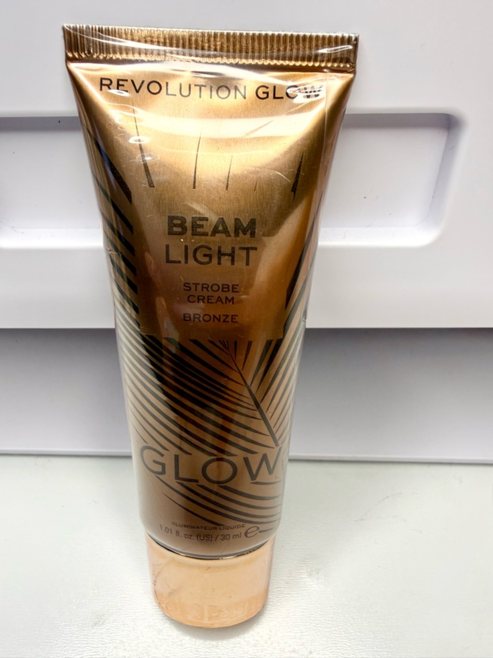 Revolution Beam Light Strobe Cream - Bronze Gold